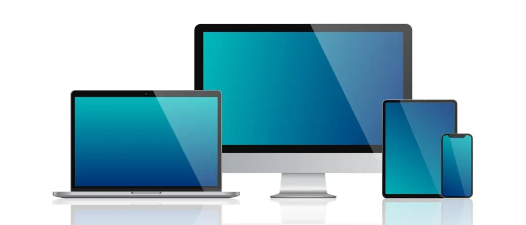 Different computer screens. Laptop, desktop, tablet and smartphone.